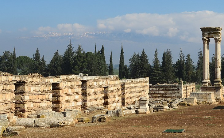 shops in the southern section of Cardo Maximus and Mount Lebanon in the background