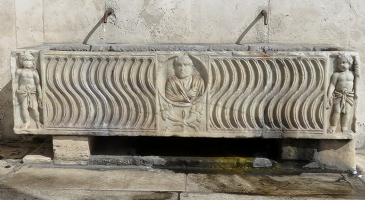 fountain making use of a IIIrd century AD sarcophagus
